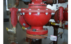 Image shows the DFT model FBC Compact Check Valve installed on the down-stream side of the Vertical Dump Valve