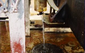 Fig. 1 Excessive amount of water being drained from a pump bearing housing